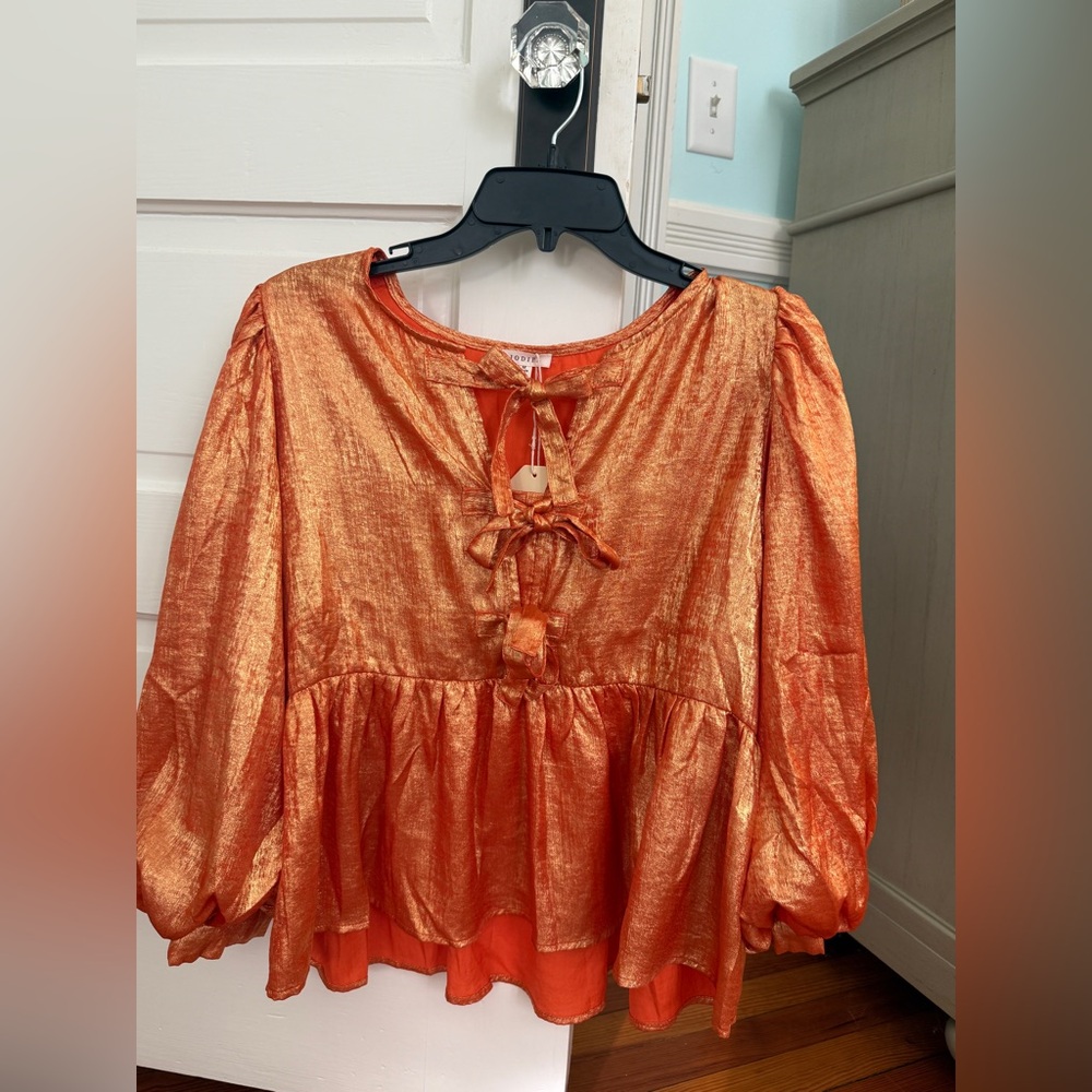 Orange shimmer long sleeve top medium